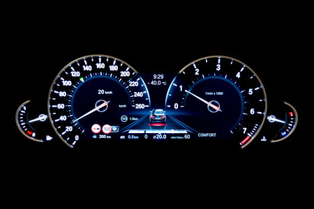 Dashboard and digital display of a modern car, mileage, fuel consumption, speedometer. New and...