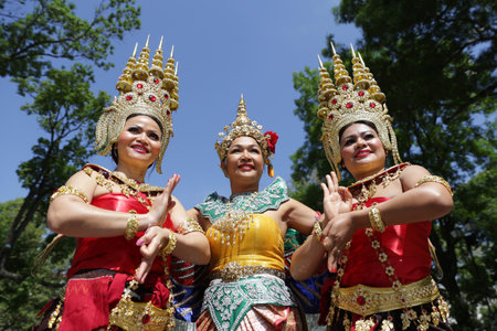 Sofia, Bulgaria - May 19, 2016: Three female performers are showing traditional Thailand clothes and jewelries during a "Day of Thai culture" in Sofia.のeditorial素材