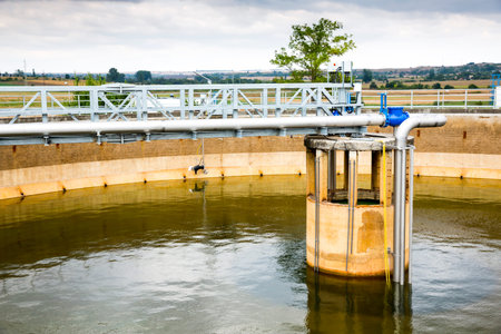 Sludge Recirculation Clarifier Solid Contact Sedimentation Tank. Green dirty water. Wastewater...