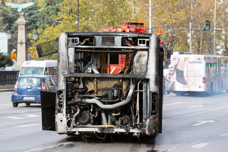 Sofia, Bulgaria - November 8, 2016: Burnt public traffic bus is seen on the street after caught in...