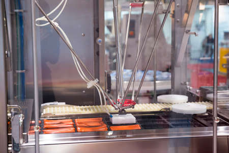 Weenie machine is shown at a food and drink exhibition.の写真素材