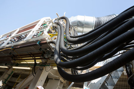 Rubber oil hoses with high pressure (16 bar) of a big modern industrial subway drilling machine.