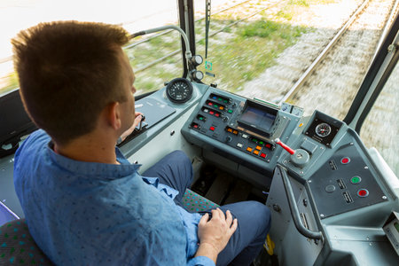 Sofia, Bulgaria - 28 June, 2017: Public transport driver drives city tram car during a test drive on new tramway cars for journalists.のeditorial素材
