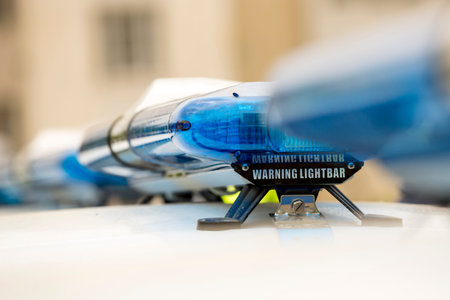 Blue warning lightbars on new patrol police cars. Close-up. 