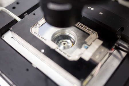 Modern microscope equipment in a microbiology research laboratory. New technology for scientists for better research and development in the labs.の写真素材