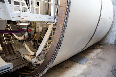 Cylinder of a big and powerful subway drilling machine. Front part of the industrial machinery.