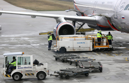 Sofia, Bulgaria - 8 March, 2017: Airport workers load Russian airplane before flight at Sofia...