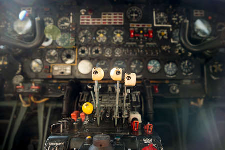 Flight desk control panel on an airplane designed for aerial cartography, reconnaissance and transport. Old technology aircraft.の写真素材