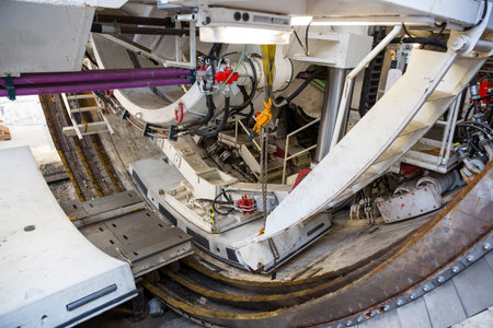 Cylinder of a big and powerful subway drilling machine. Front part of the industrial machinery.