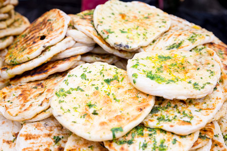 Doner kebab bread slices with garlic, oil and parsley.