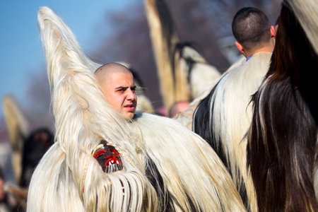 Pernik, Bulgaria - 28 January 2018: Participants take part in the International Festival of Masquerade Games Surva. The festival promotes variations of ancient Bulgarian and foreign customs and masks. Kukeri.のeditorial素材