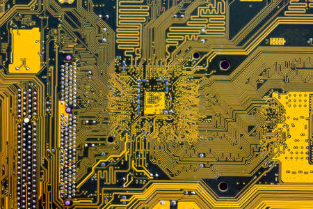 Green and yellow printed circuit board PCB. Computational equipment.の写真素材