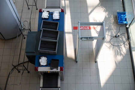 Luggage scanner security checkpoint at the airport. No people. From above.