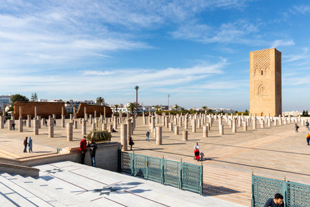 Rabat, Morocco - 29 November 2018: Tourists visit Hassan Tower or Tour Hassan which is the minaret of an incomplete mosque in Rabat, Morocco.のeditorial素材