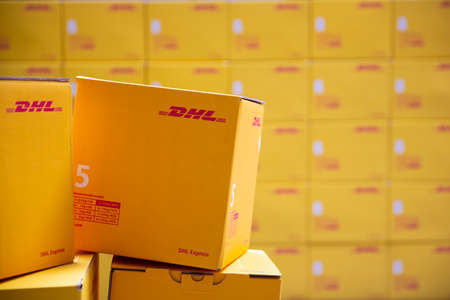Sofia, Bulgaria - 17 October, 2018: Yellow DHL Express packages are seen arranged in a warehouse.の写真素材