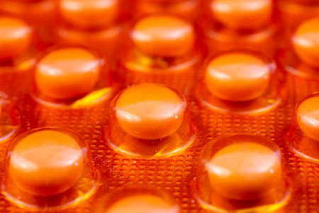 Vitamin C in a plastic pack - blister. Global pharmaceutical industry for billions dollars per year. Pharmaceutical drugs for use as medications. Studio shot.の写真素材