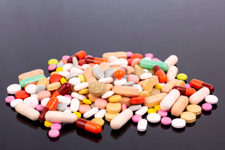 Different colorful pills and capsules. Global pharmaceutical industry for billions dollars per year....