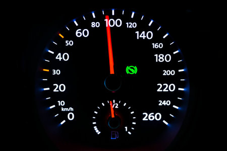 Modern light car mileage (dashboard, milage) isolated on a black background. New display of a modern...