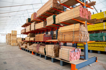 Wooden planks in a factory. Wood and wood-based materials industry.の写真素材