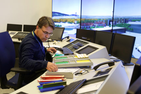 Sofia, Bulgaria - 20 February, 2020: A trainer is seen in an air traffic control room simulator during a tour.のeditorial素材