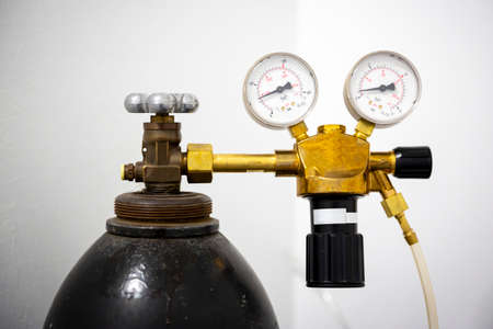 Gas welding equipment on a tank. Pressure gauges used in welding, cutting and allied processesの写真素材