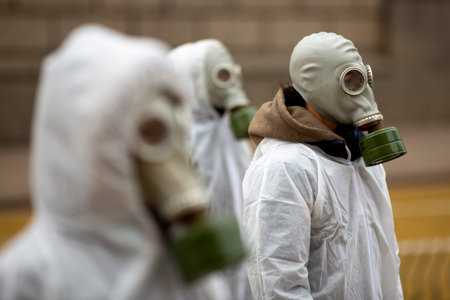 Sofia, Bulgaria - 9 December, 2020: Environmentalists protest against Bulgaria's minks fur farms wearing gas masks.のeditorial素材