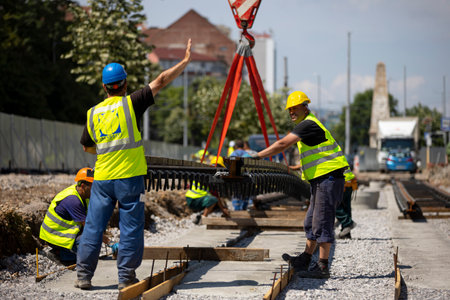 Sofia, Bulgaria - 6 July, 2021: Workers install new tram rails during a reconstruction of the route.のeditorial素材