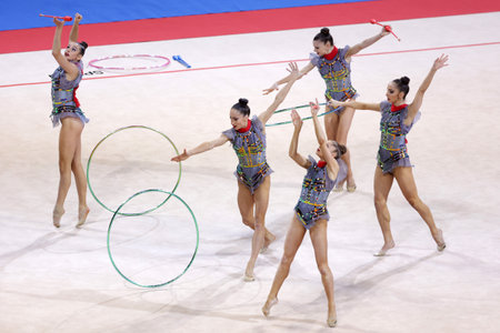 Sofia, Bulgaria - 27 March, 2021: Team Bulgaria perform during the 3 Hoops + 2 pairs of Clubs group qualifications at the 2021 Rhythmic Gymnastics "Sofia World Cup".のeditorial素材