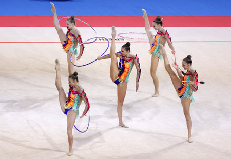 Sofia, Bulgaria - 27 March, 2021: Team Belarus perform during the 3 Hoops + 2 pairs of Clubs group qualifications at the 2021 Rhythmic Gymnastics "Sofia World Cup".のeditorial素材
