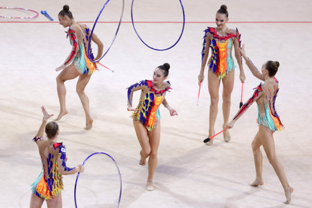 Sofia, Bulgaria - 27 March, 2021: Team Belarus perform during the 3 Hoops + 2 pairs of Clubs group qualifications at the 2021 Rhythmic Gymnastics "Sofia World Cup".のeditorial素材