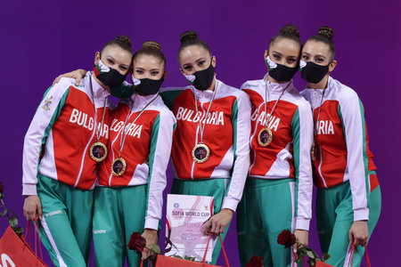 Sofia, Bulgaria - 27 March, 2021: Members of team Bulgaria pose with their gold medals on the podium at Group Award Ceremony for All-Around at the 2021 Rhythmic Gymnastics "Sofia World Cup".のeditorial素材