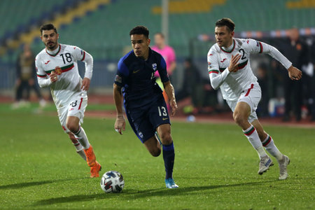 Sofia, Bulgaria - 15 November, 2020: Bulgaria's Galin Ivanov (L) and Strahil Popov (R) in action with Finland's Pyry Soiri (C) during the UEFA Nations League group stage, League B, Group 4 match between Bulgaria and Finland.のeditorial素材