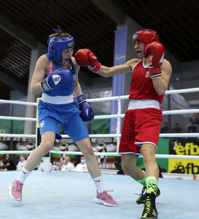 Sofia, Bulgaria. 27th February, 2021. Stoyka Krasteva (red) of Bulgaria and Angelina Lukas of Kazakhstan fight in their final round of Fly (W51kg) category of the 72-nd International Boxing Tournament "Strandja" 2021.のeditorial素材