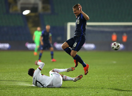 Sofia, Bulgaria - 15 November, 2020: Bulgaria's Birsent Karagaren (L) in action with Finland's Jere Uronen (R) during the UEFA Nations League group stage, League B, Group 4 match between Bulgaria and Finland.のeditorial素材