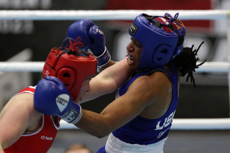 Sofia, Bulgaria - 26 February, 2021: Aoife O'Rourke (red) of Ireland and Naomi Graham of USA fight in their semifinal round of Middle (W75kg) category of the 72-nd International Boxing Tournament "Strandja" 2021.のeditorial素材