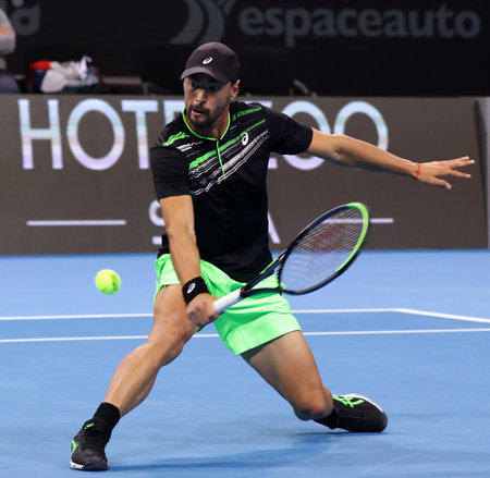Sofia, Bulgaria - 28 September, 2021: Bulgaria's Dimitar Kuzmanov in action against Italy's Lorenzo Musetti during the ATP 250 Sofia Open.のeditorial素材