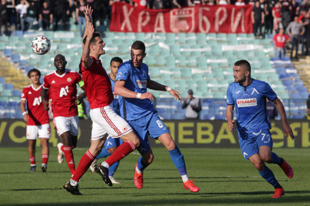 Sofia, Bulgaria: 25 April, 2021: Menno Koch (C) of CSKA Sofia in action against Martin Petkov (R) of Levski during the national championship football match between Levski and CSKA Sofia.のeditorial素材