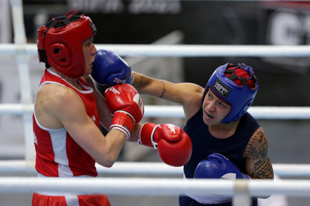 Sofia, Bulgaria. 27th February, 2021. Mira Potkonen (red) of Finland and 
Beatriz Ferreira of Brazil fight in their final round of Light Welter (W60kg) category of the 72-nd International Boxing Tournament "Strandja" 2021.のeditorial素材