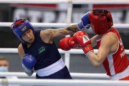 Sofia, Bulgaria. 27th February, 2021. Mira Potkonen (red) of Finland and 
Beatriz Ferreira of Brazil fight in their final round of Light Welter (W60kg) category of the 72-nd International Boxing Tournament "Strandja" 2021.のeditorial素材