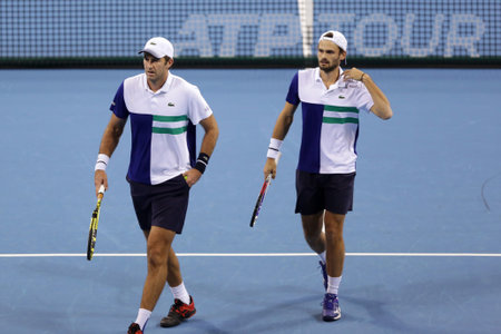Sofia, Bulgaria - 12 November, 2020: France's Fabrice Martin (L)and Monaco's Hugo Nys (R) in action during their semi-final doubles match against Great Britain's Jamie Murray and Great Britain's Neal Skupski during the Sofia Open ATP 250 tennis tournamentのeditorial素材