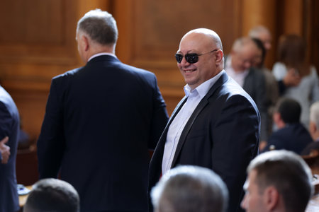 Sofia, Bulgaria - 29 July, 2021: Deputy with black sunglasses is seen in the parliament plenary hall of The National Assembly of the Republic of Bulgaria before a session.のeditorial素材