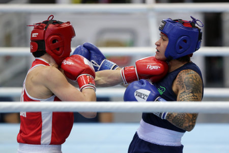 Sofia, Bulgaria. 27th February, 2021. Mira Potkonen (red) of Finland and 
Beatriz Ferreira of Brazil fight in their final round of Light Welter (W60kg) category of the 72-nd International Boxing Tournament "Strandja" 2021.のeditorial素材