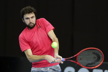 Sofia, Bulgaria - 10 November, 2020: France's Gilles Simon in action against Slovakia's Andrej Martin during the ATP 250 Sofia Open qualifications.のeditorial素材
