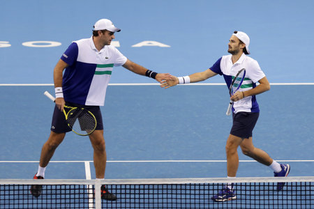 Sofia, Bulgaria - 12 November, 2020: France's Fabrice Martin (L) and Monaco's Hugo Nys (R) in action during their semi-final doubles match against Great Britain's Jamie Murray and Great Britain's Neal Skupski during the Sofia Open ATP 250 tennis tournamenのeditorial素材