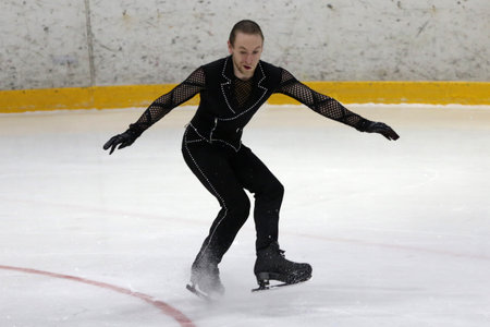 Sofia, Bulgaria - 28 February, 2021: Larry Loupolover of Bulgaria performs during the senior men free skating category of Sofia Trophy International Figure Skating Competition.のeditorial素材