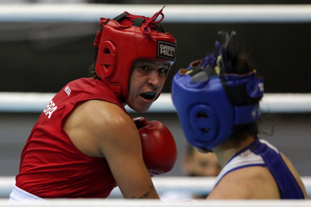 Sofia, Bulgaria - 26 February, 2021: Beatriz Ferreira (red) of Brazil and Nune Asatrian of Russia fight in their semifinal round of Light Welter (W60kg) category of the 72-nd International Boxing Tournament "Strandja" 2021.のeditorial素材