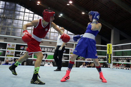 Sofia, Bulgaria - 26 February, 2021: Stoyka Krasteva (RED) of Bulgaria and Virginia Fuchs of USA fight in their semifinal round of Fly (W51kg) category of the 72-nd International Boxing Tournament "Strandja" 2021.のeditorial素材
