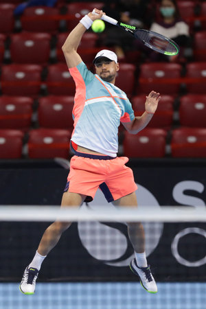 Sofia, Bulgaria - 10 November, 2020: Bulgaria's Dimitar Kuzmanov in action against Australia's Jurgen Melzer and France's Edouard Roger-Vasselin during the ATP 250 Sofia Open doubles qualifications.のeditorial素材