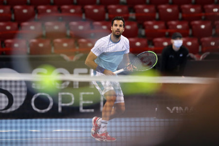 Sofia, Bulgaria - 12 November, 2020: Italy's Salvatore Caruso in action during his quarter-final match against France's Richard Gasquet during the Sofia Open ATP 250 tennis tournament.のeditorial素材