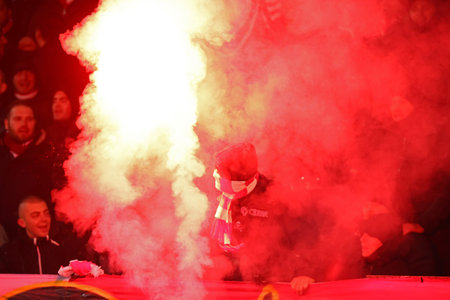 Sofia, Bulgaria - 9 December, 2021: Fans of CSKA Sofia light flares during the UEFA Europa Conference League group C soccer match between CSKA Sofia and AS Roma.のeditorial素材